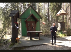 The mayor of Janów Lubelski in Uroczysko Kruczek stands in front of the chapel and wishes Easter